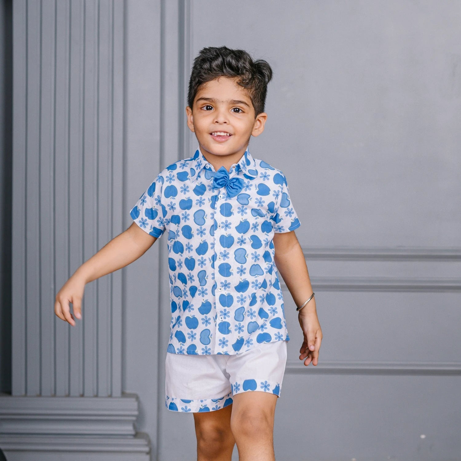 BLUE APPLE PRINT SHIRT PAIRED WITH WHITE SHORTS